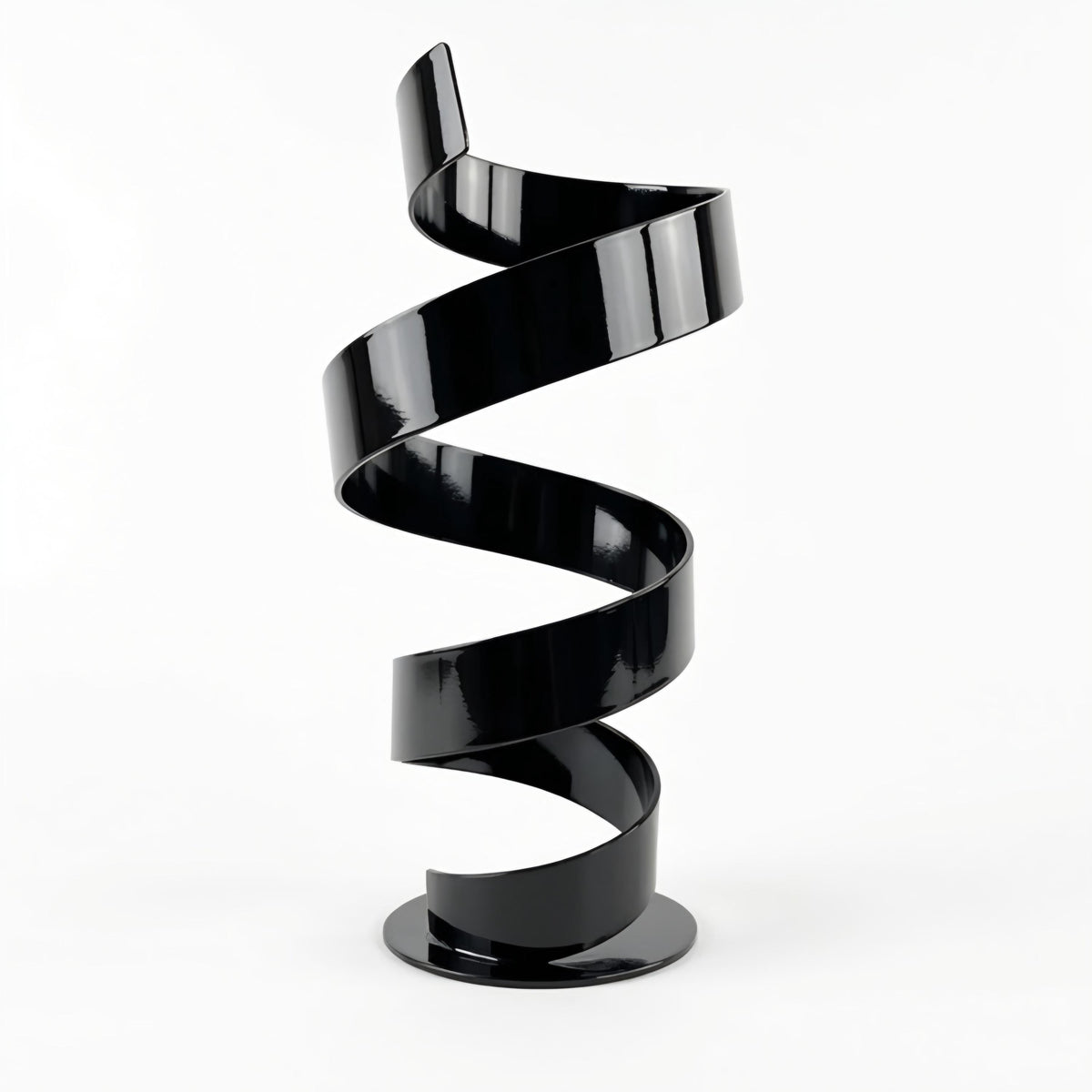 A black spiral sculpture stands alone against a white background.