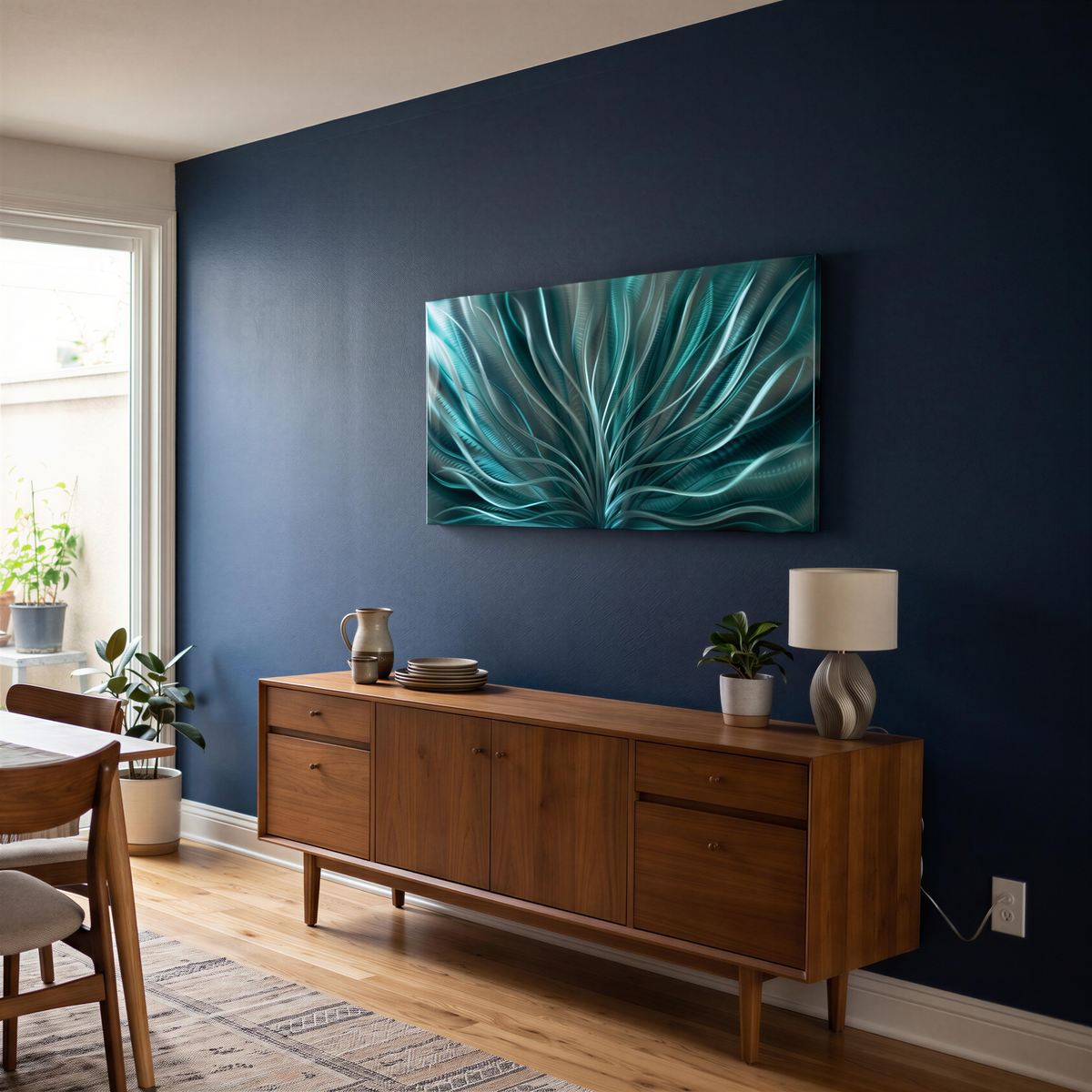 a dining room with a blue wall and a painting on the wall