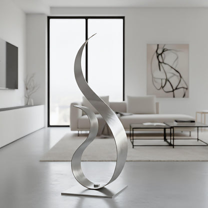 a modern, minimalist living room with a large, abstract sculpture in the foreground.