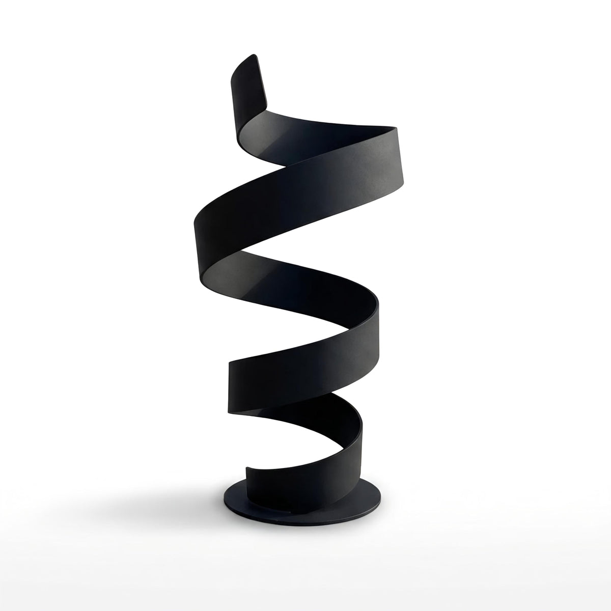 A black spiral sculpture stands alone against a white background.