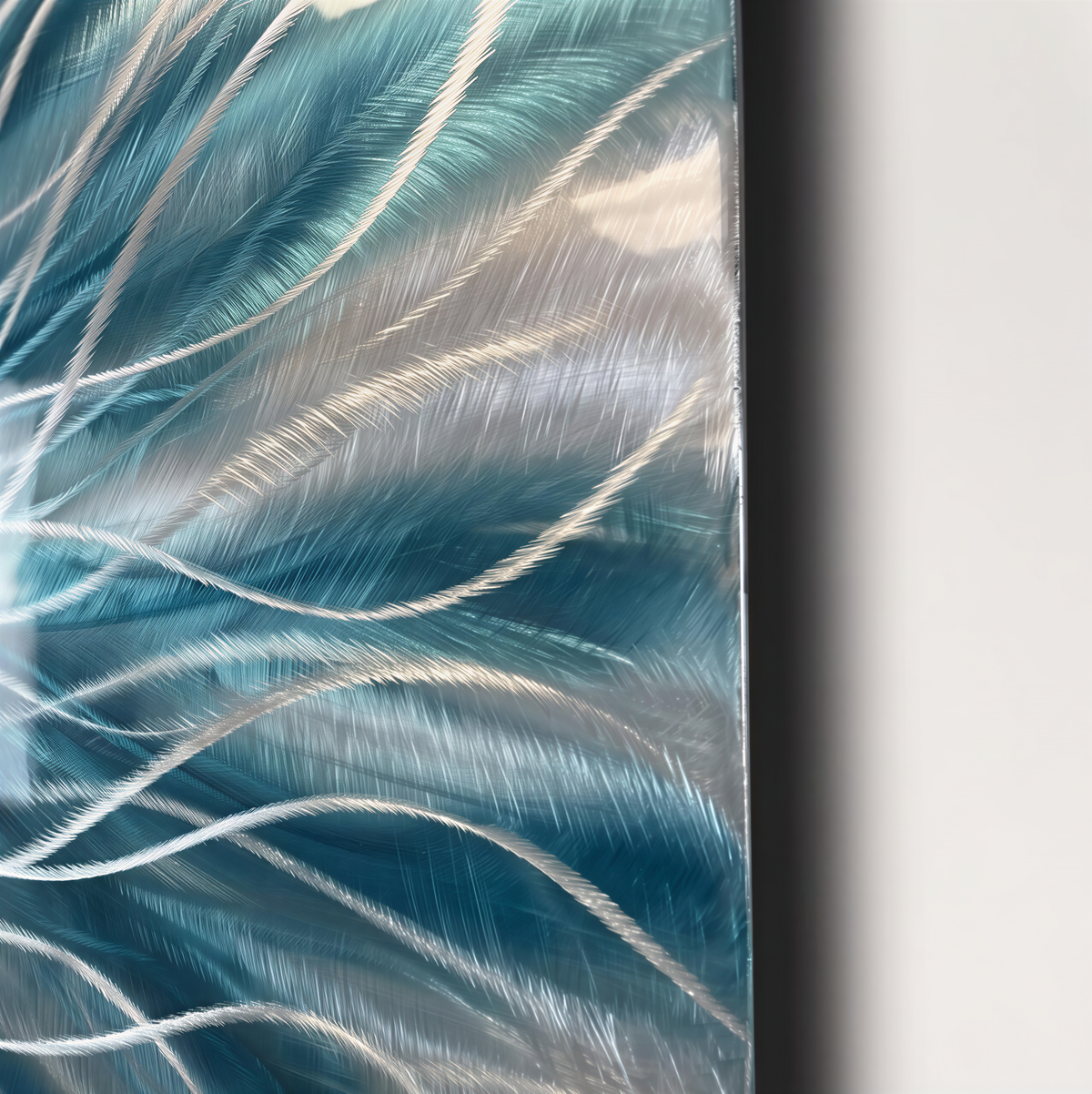 a painting of blue and white feathers on a white wall