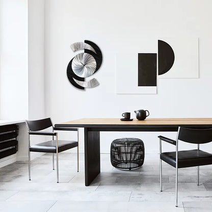 a dining table with chairs and a mirror