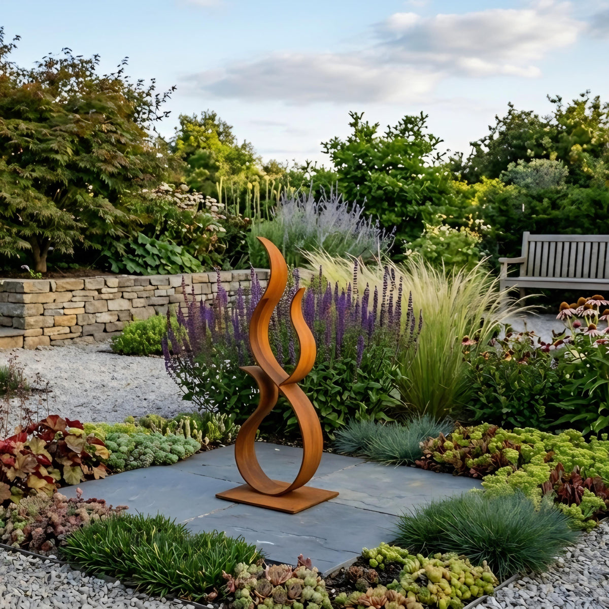 A garden with a large, abstract metal sculpture in the center, surrounded by various plants and flowers.