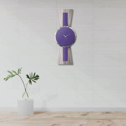 a purple clock on a wall next to a plant