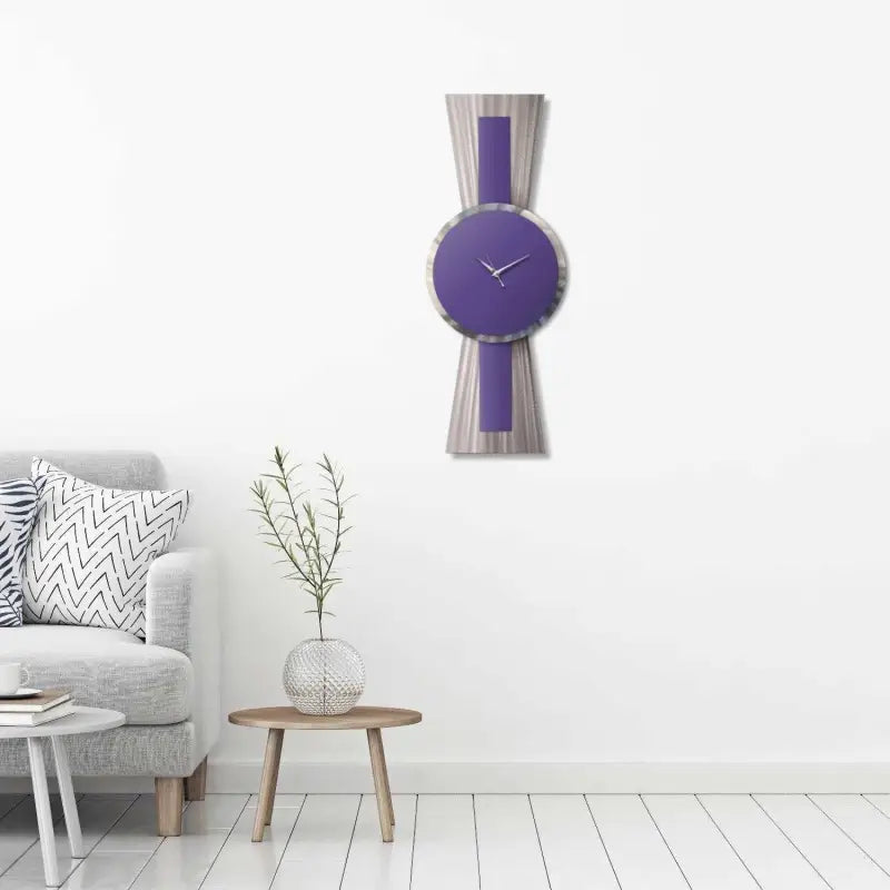 a purple clock on a wall in a living room