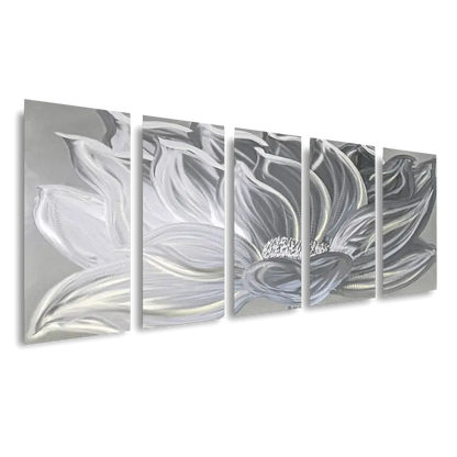 a set of three abstract metal wall art pieces